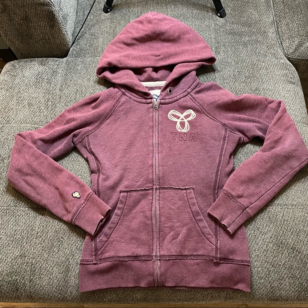 Classic TNA Zip-Up Hoodie, in a Rich Burgundy Color.